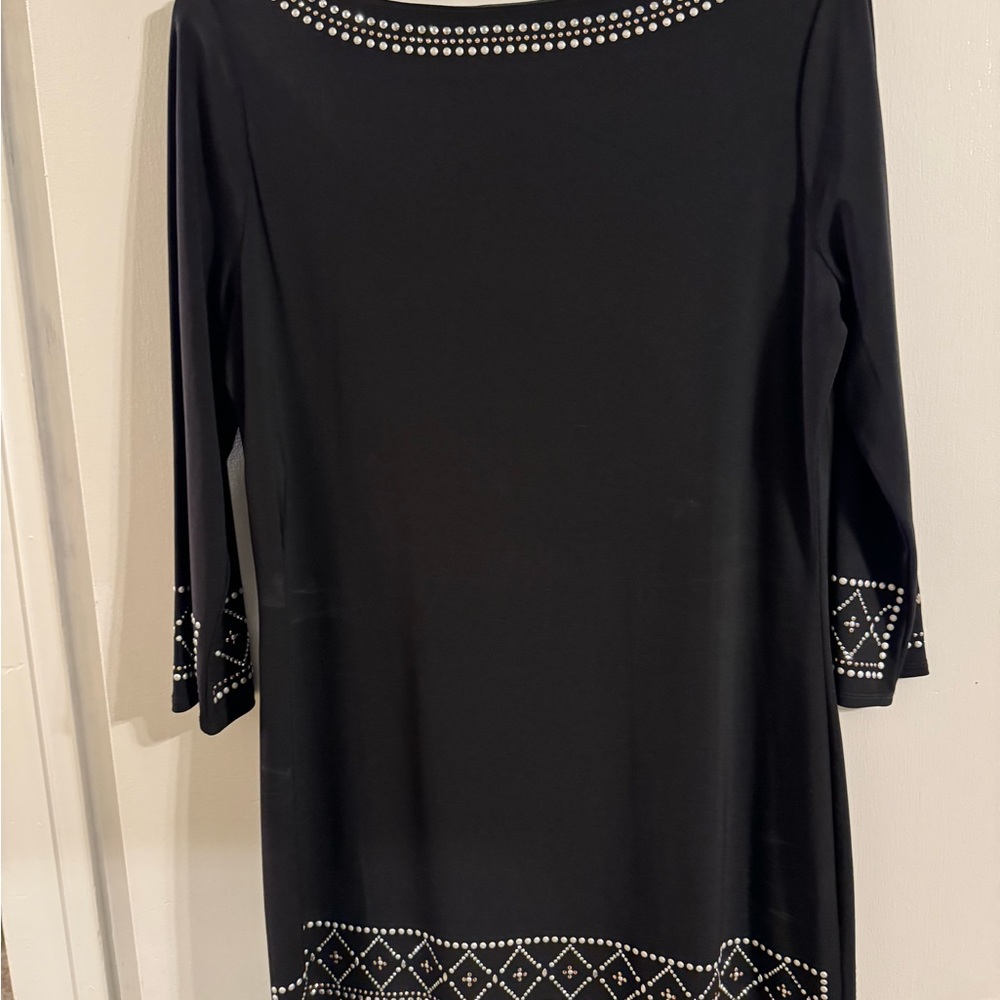 Beautiful mid length elegant dress.